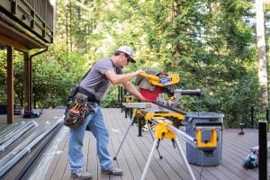 A Cascade Fence & Deck employee works on a project in Vancouver, WA