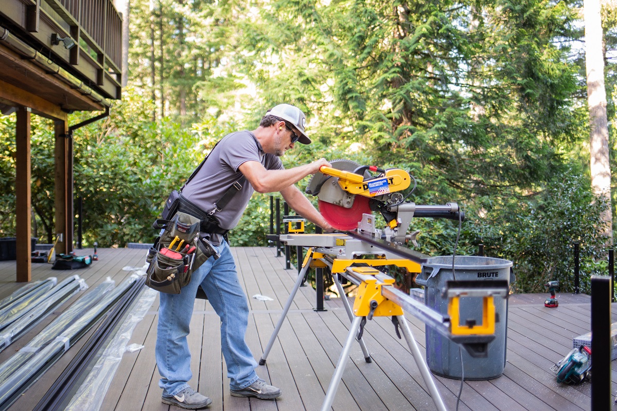 A Cascade Fence & Deck employee works on a project in Vancouver, WA