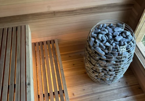 Interior of a custom sauna with underlit benches
