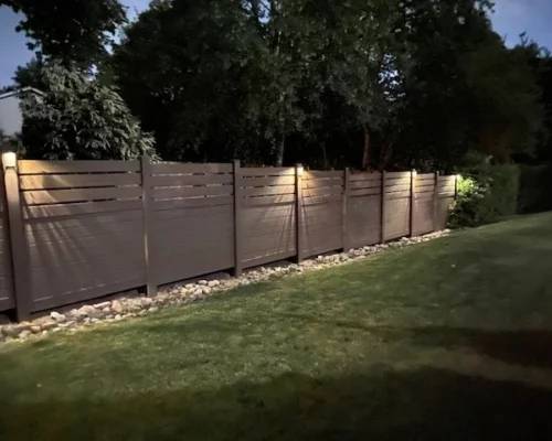 Custom-Dark-Walnut-Vinyl-Fence-With-Lighting